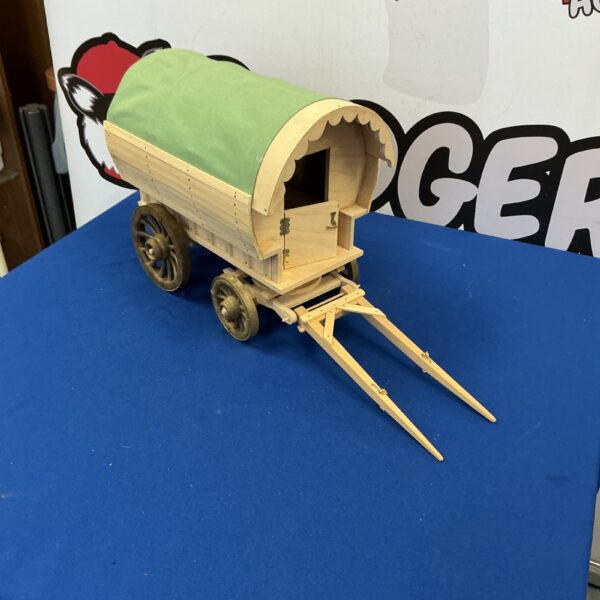 Detailed front view of a miniature travellers caravan model.