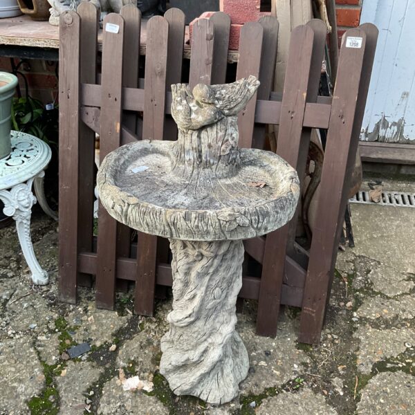 Vintage cast stone tree stump bird bath for garden use.