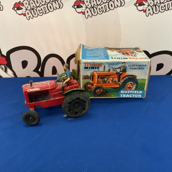 Vintage Triang Minic Nuffield tractor, tinplate clockwork toy.