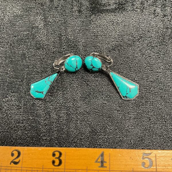 Silver turquoise drop earrings with a beautiful stone matrix.