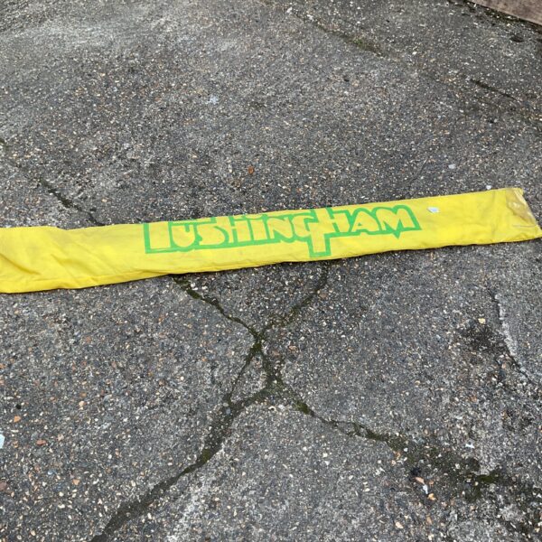 Yellow Tushingham windsurf sail, vintage watersports equipment.