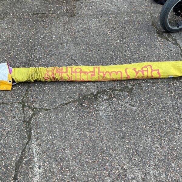 Used Tushingham windsurf sail showing wear and tear.