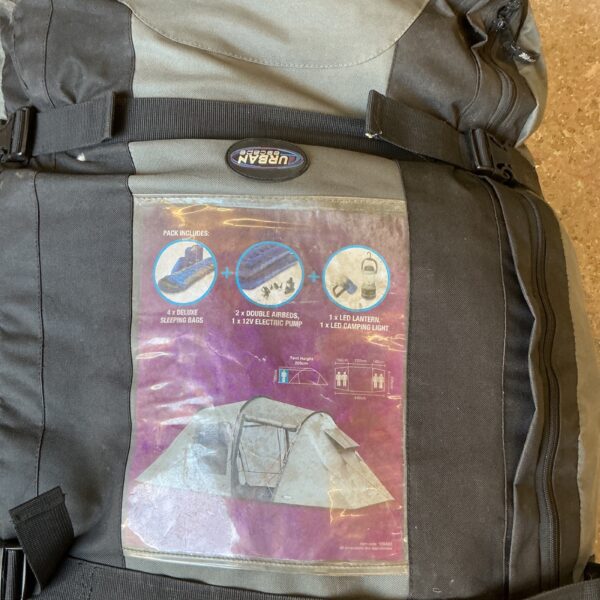 Urban Escape 4 person tent with packaging and accessories.