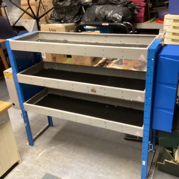 Metal van shelving unit for commercial storage and organization.