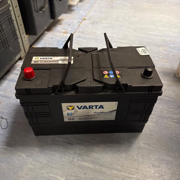Varta 12v 90ah G2 car battery, side view.