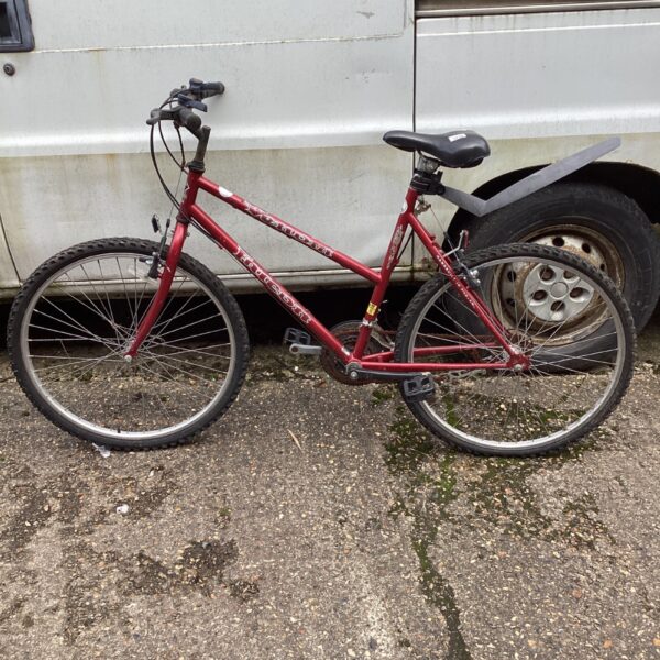 Side view of a vintage Venom Falcon mountain bike.