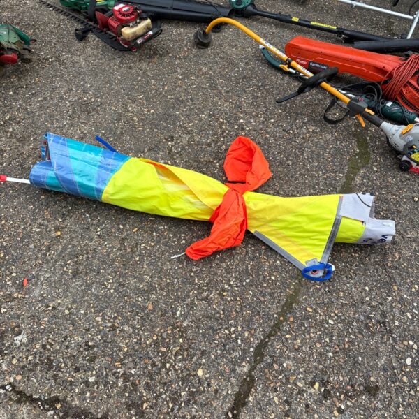 Vibrant orange and blue Ventura Fun 4.3 windsurf sail for watersports.