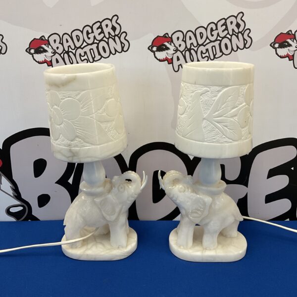 Pair of vintage alabaster elephant table lamps with lampshades.