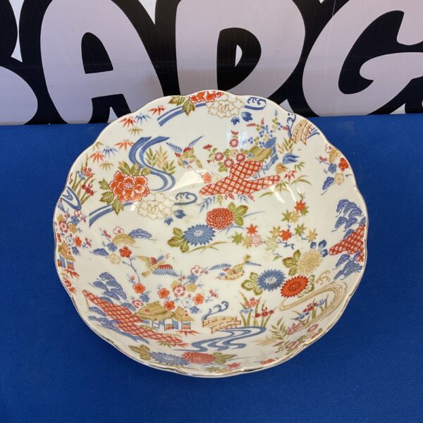 Front view of a vintage Asahi Japanese patterned porcelain bowl.