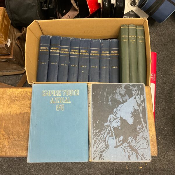 Vintage book lot featuring Punch magazine and Rudyard Kipling books.