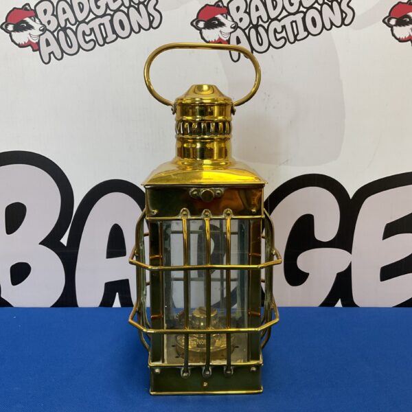 Vintage brass caged lantern with protective cage.