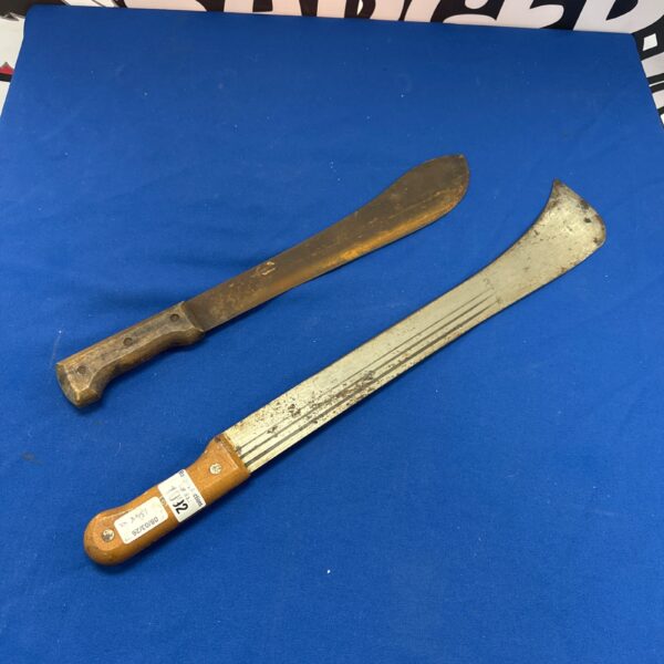 Vintage bush knife lot with wooden handles, ideal for collectors.