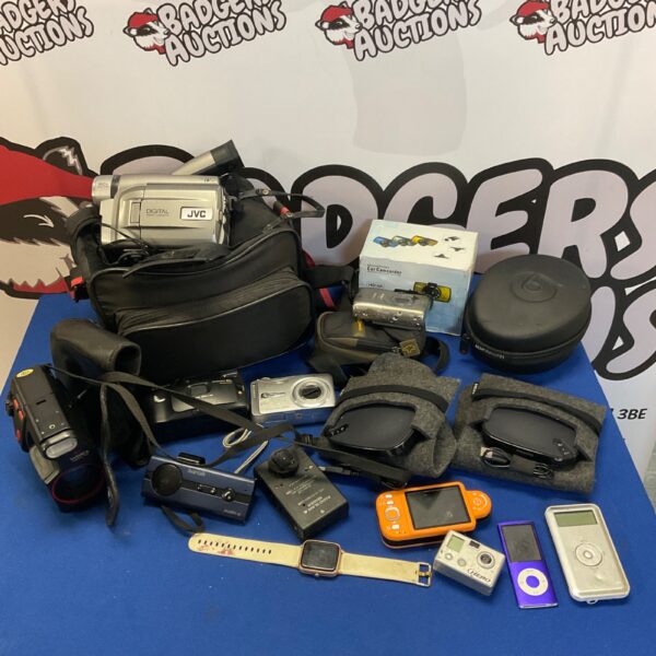 Vintage camera lot featuring JVC, Fuji, and Canon cameras.