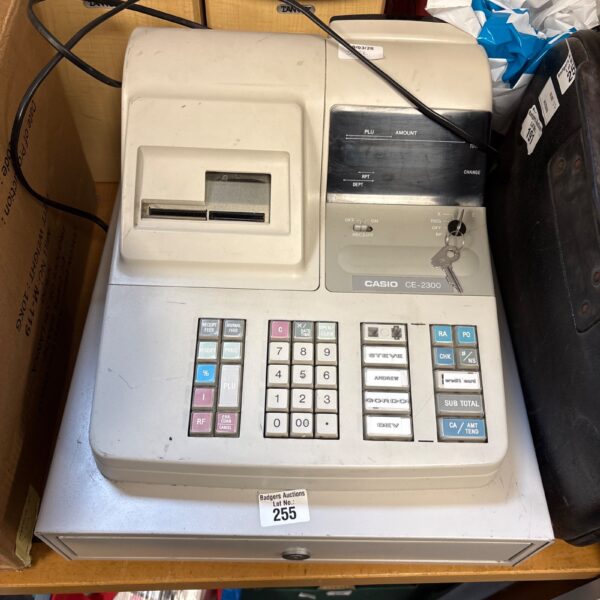 Vintage Casio CE-2300 cash register, a retro shop till.