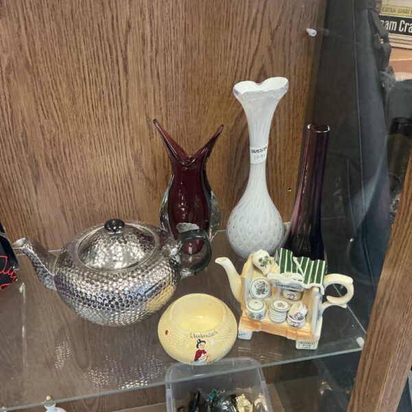 Vintage ceramic teapot with a classic design.