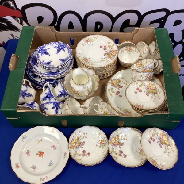 Vintage china tea set with Foley pieces, floral patterns, and delicate designs.