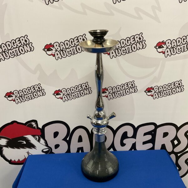 Vintage chrome and glass hookah pipe for shisha smoking.