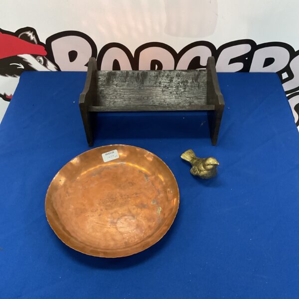Vintage copper dish with aged patina for serving or display.