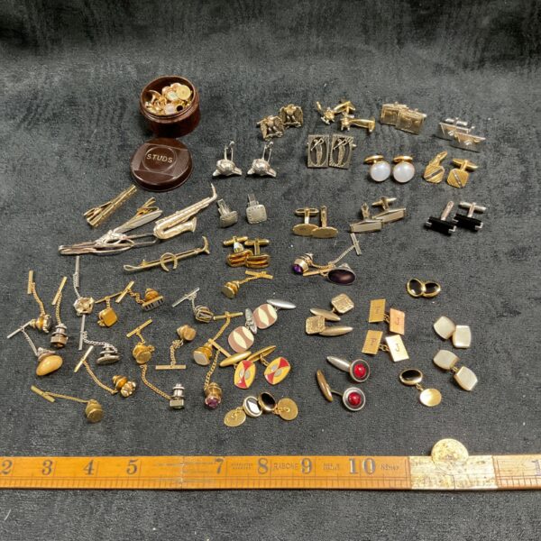 Vintage cufflinks and tie pins collection, a variety of men's accessories.