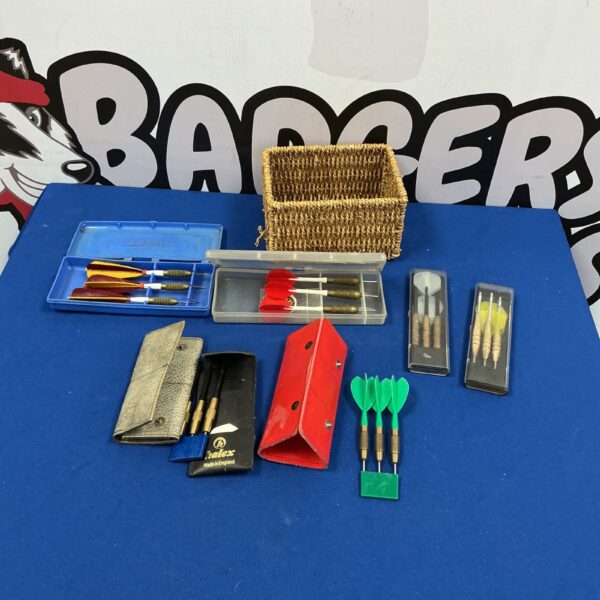 Vintage dart sets in original cases, collectible antique darts.