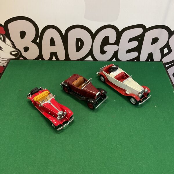 Vintage diecast car collection featuring a 1935 Mercedes Benz.