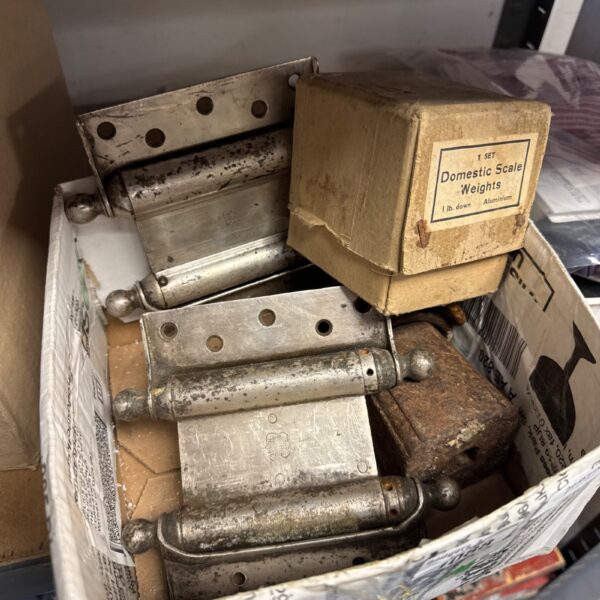 Vintage door hinges and iron weights, antique hardware lot.