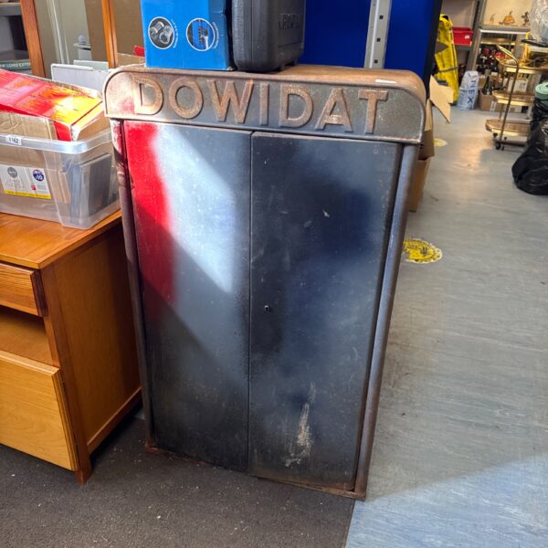 Front view of a vintage Dowidat tool cabinet in a workshop setting.