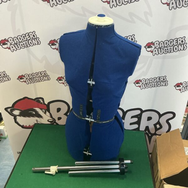Vintage dress form manikin with stand, ideal for tailoring projects.