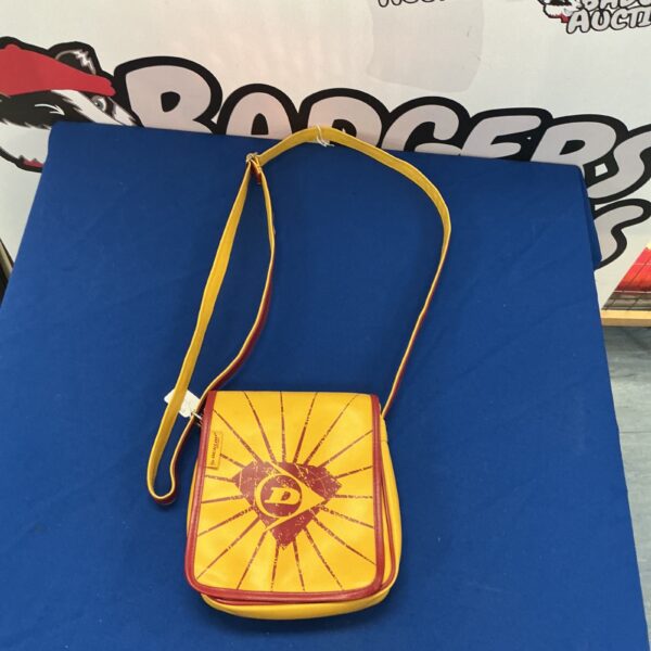 Vintage yellow Dunlop shoulder bag, retro sports accessory.