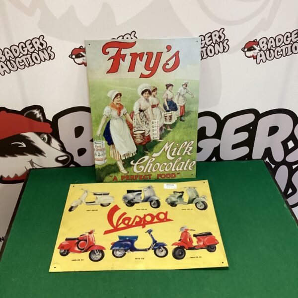 Vintage Fry's Chocolate sign featuring a classic Vespa scooter.