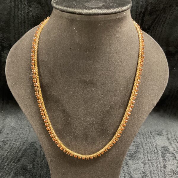 Vintage glass pennino necklace with topaz coloured beads.