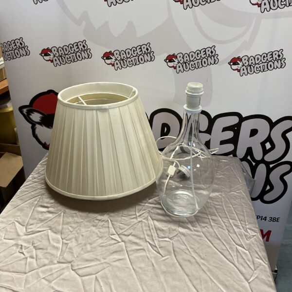 Vintage glass table lamp with ribbed shade for home decor.