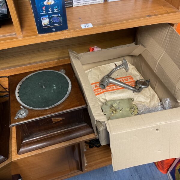Vintage gramophone with records, antique music player.