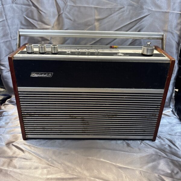 Vintage Hacker Sovereign III radio in wooden cabinet.