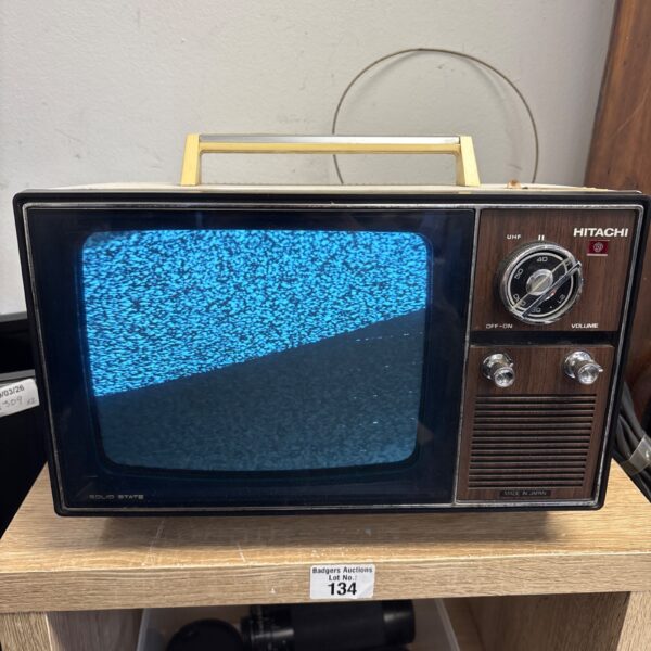 Vintage Hitachi transistor TV receiver model I-89-311, retro collectible.
