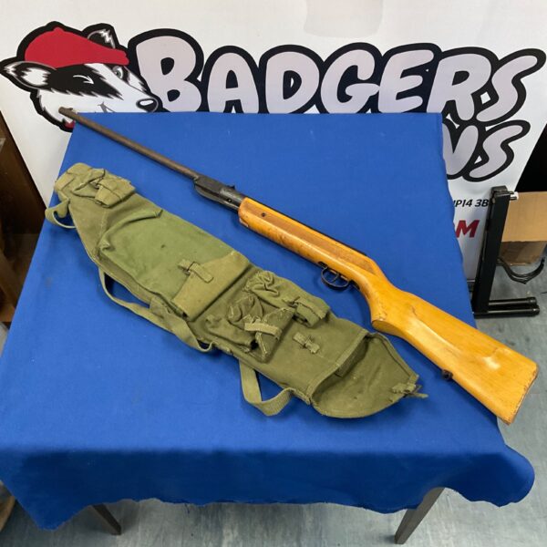 Vintage Hungarian air rifle with canvas protective slip.