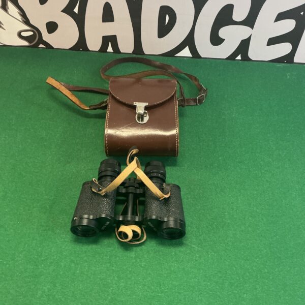 Vintage Jena 8x39w binoculars in a worn leather case.