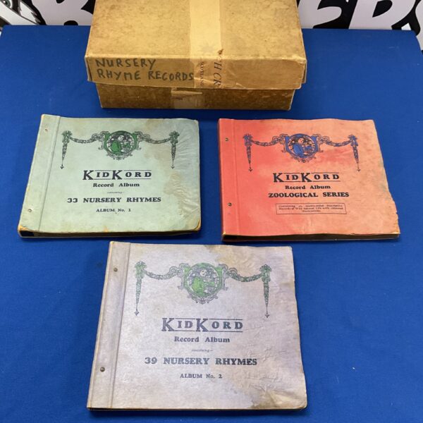 Group of vintage KidKord record albums from the 1930s.