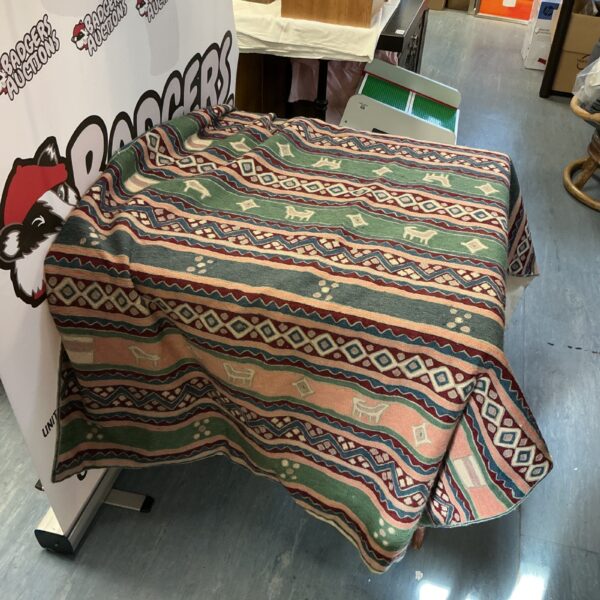Vintage Kilim rug with a striking geometric pattern.