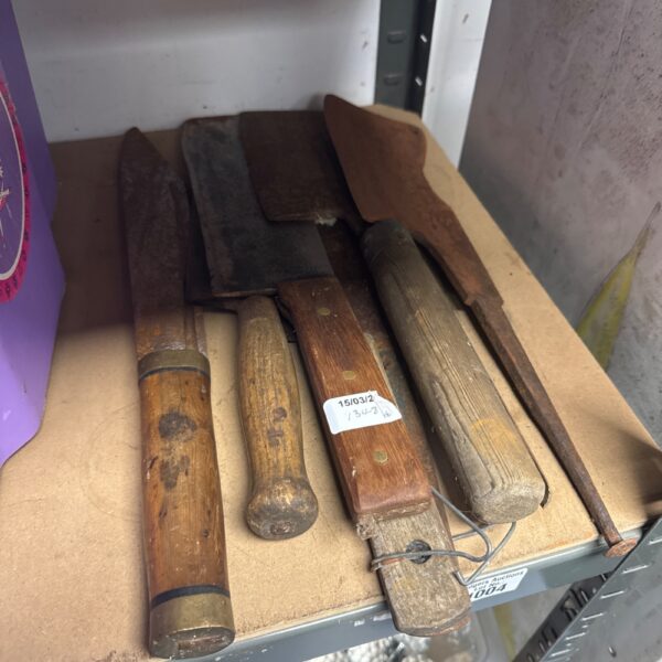 Lot of six vintage knives and cleavers with wooden handles.