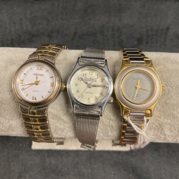 Vintage Sekonda and Techno ladies watches, gold tone, 1980s style.