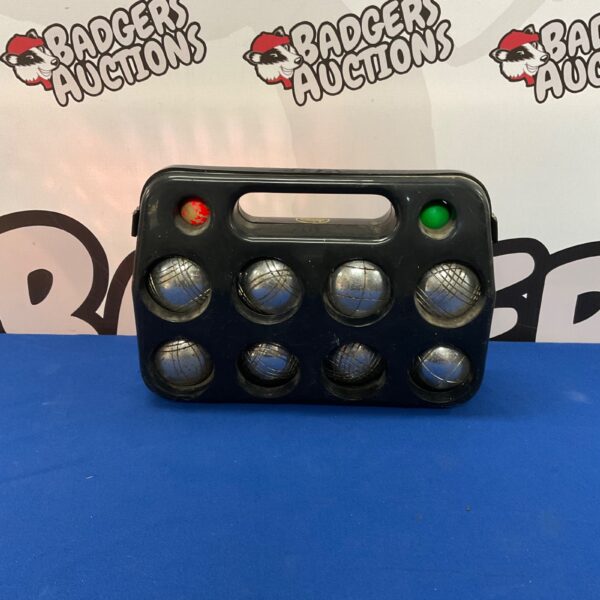 Vintage metal boules set with eight boules in a case.