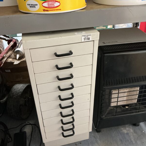 Vintage metal drawer units for workshop or garage storage.