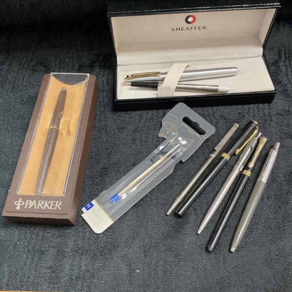 Vintage pen collection featuring Parker and Shaeffer brands.