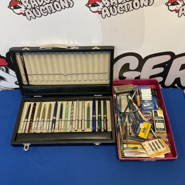 Vintage pen collection in a fitted case with Conway Stewart pens.