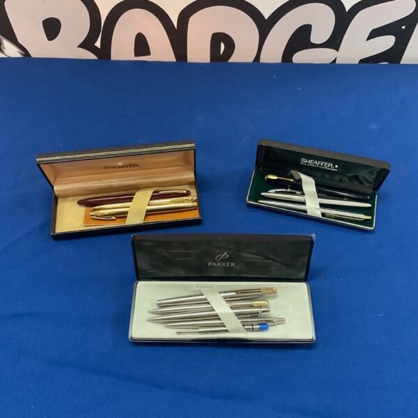 Vintage pen sets including Parker and Sheaffer in original boxes.