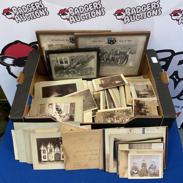 Vintage photograph collection featuring sepia-toned portraits and historical images.