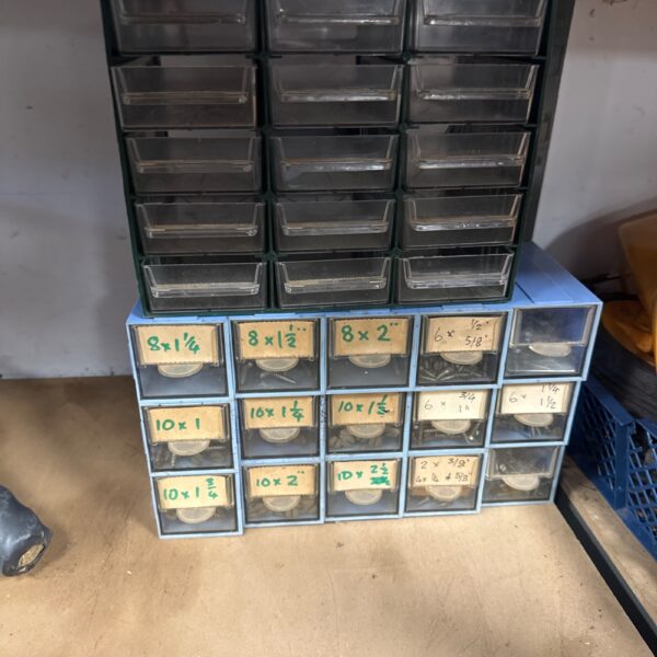 Vintage plastic organiser drawers for small parts and storage.