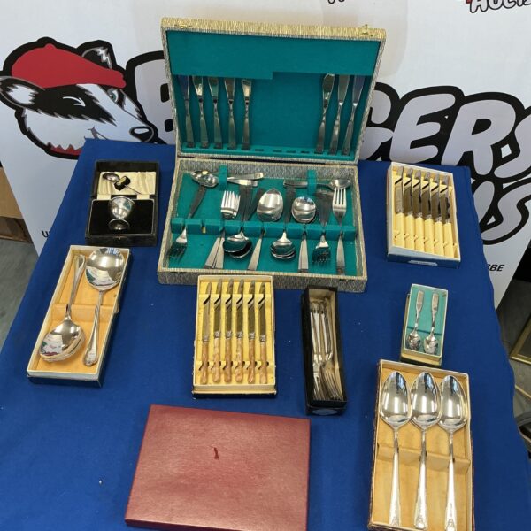 Vintage silverplate cutlery set in a fitted case, classic tableware.