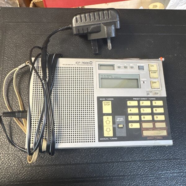 Vintage Sony ICF-7600D radio with antenna.